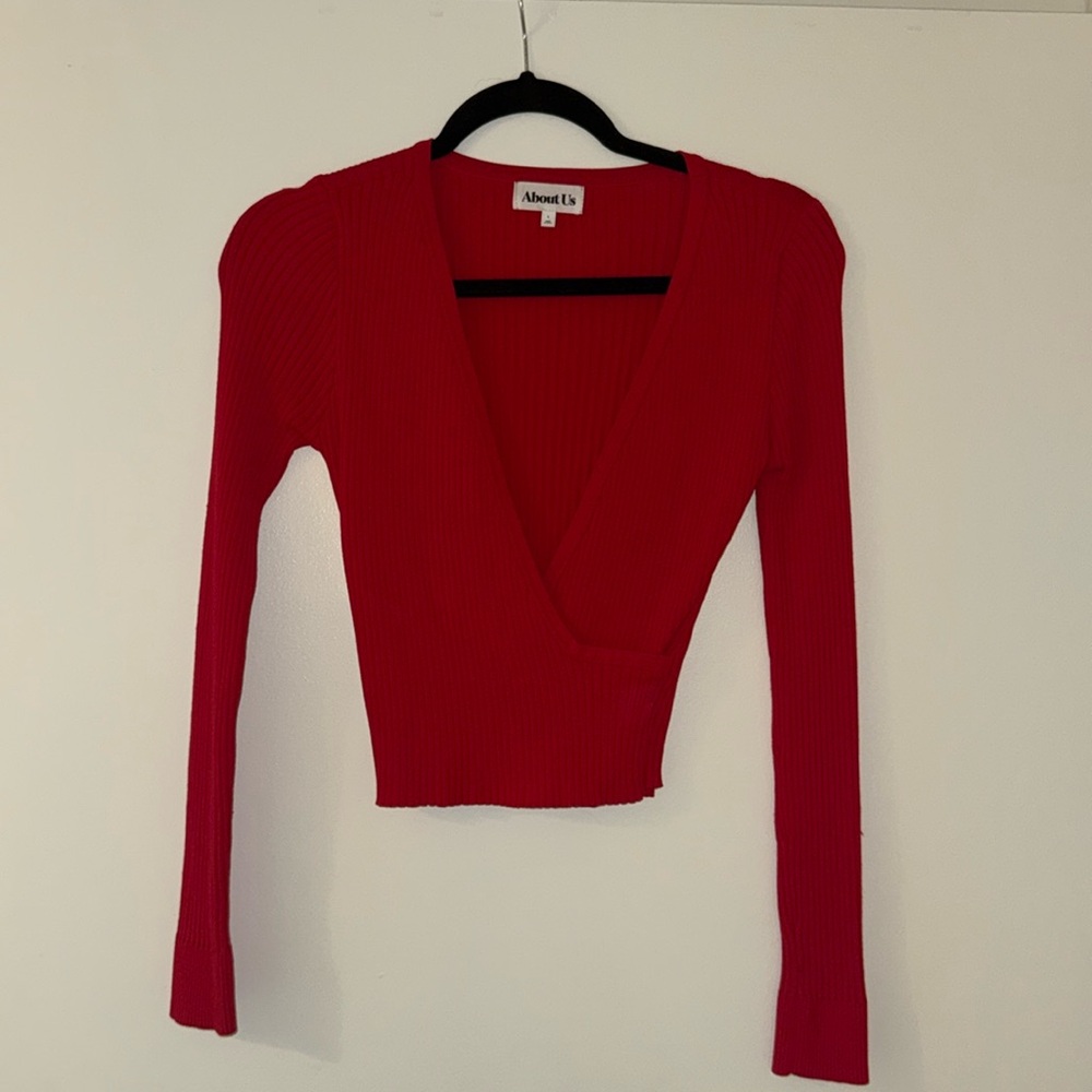 About Us red long sleeve shirt